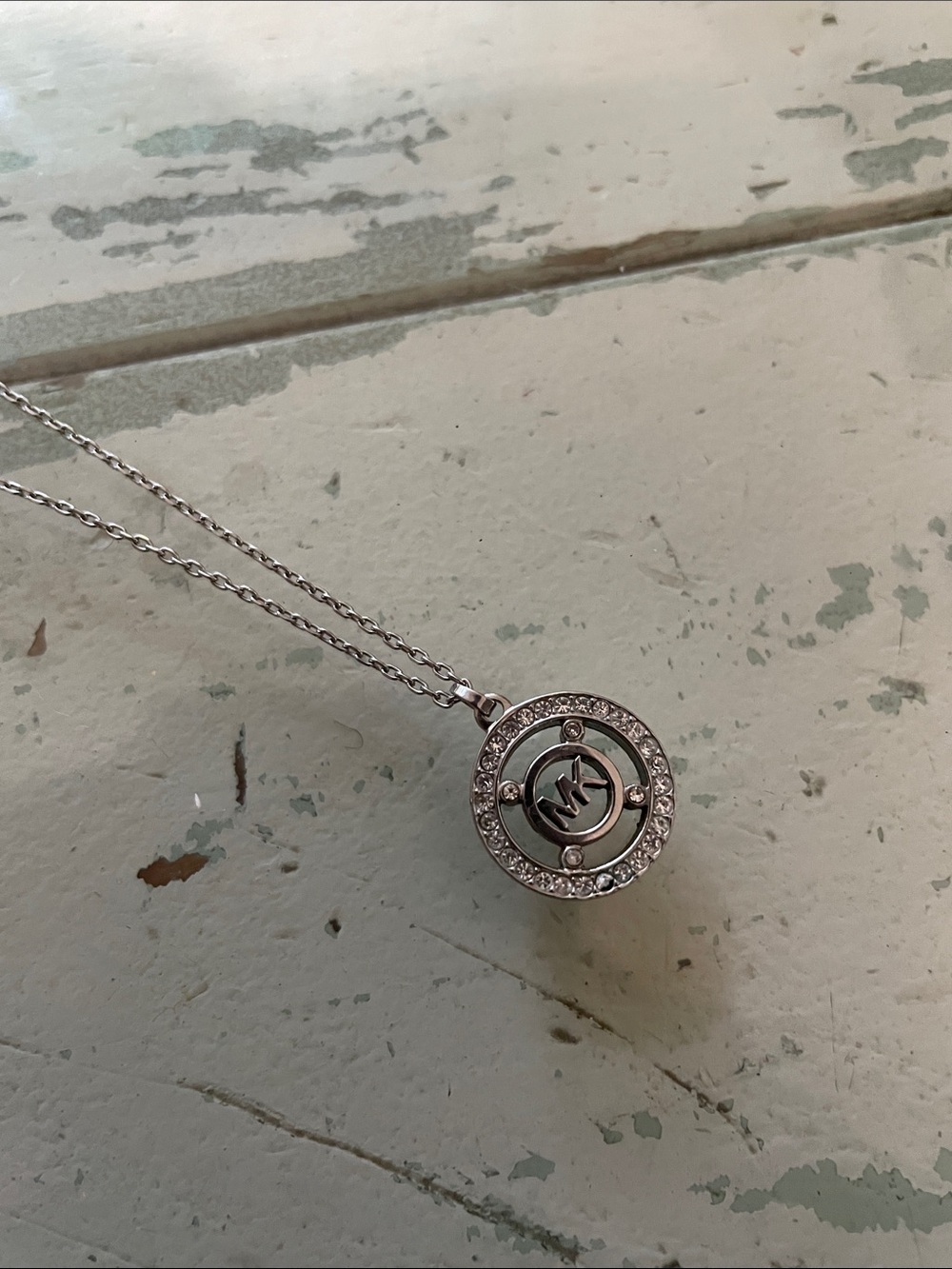 Michael Kors Silver Crystal Logo Circle Pendant Necklace